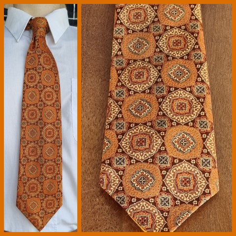 1970's Tie, Orange/brown/beige printed, by 'Ensign', polyester.